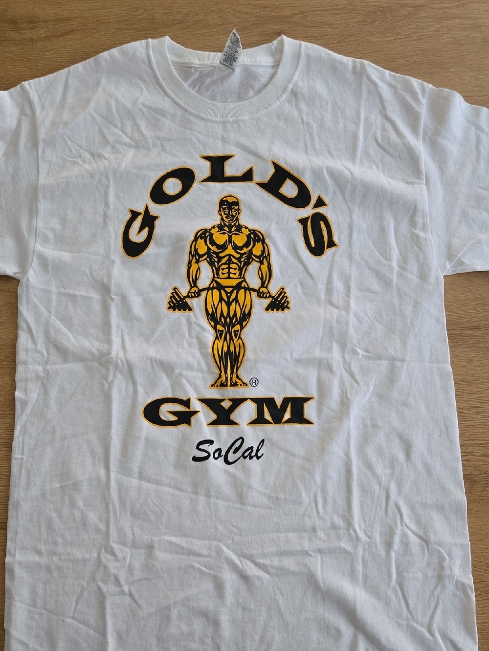Gold's Gym SoCal Short Sleeve T‑Shirt in White with Black & Yellow Logo